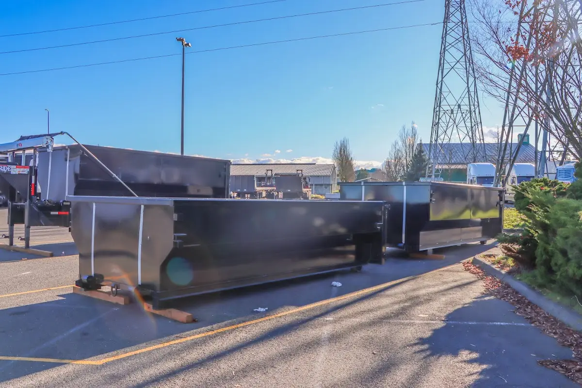 Roll-off dumpster ready for waste disposal at job site for Construction Dumpster Rental in East Hemet